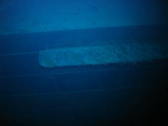 Concealment flap for above-water torpedo tubes on stbd side